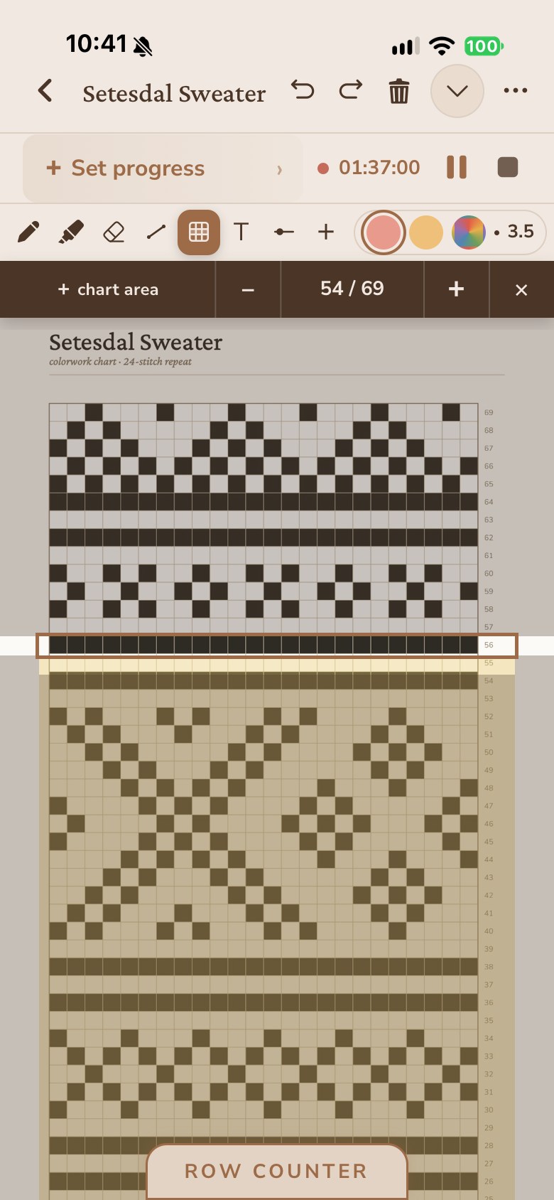 A colorwork chart open in the app, under the pattern name and the pen tools. The rows already worked are shaded, the current row is marked, and the counter above reads twenty-three of sixty-nine.