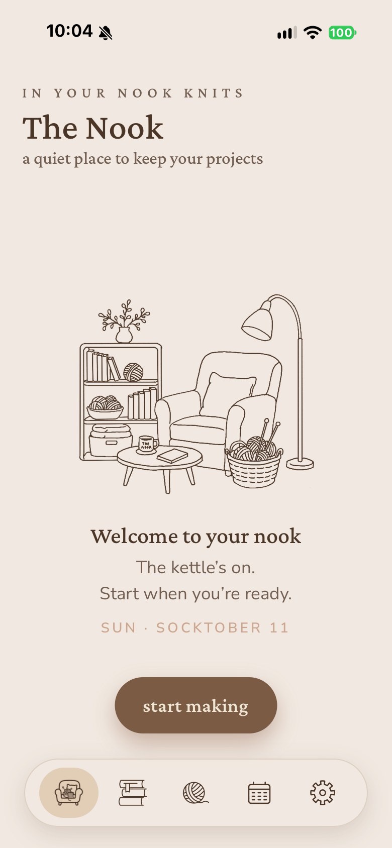 The Knitting Nook home screen on an iPhone with nothing in progress: a line drawing of an armchair, a yarn basket and a bookshelf, under the words Welcome to your nook.