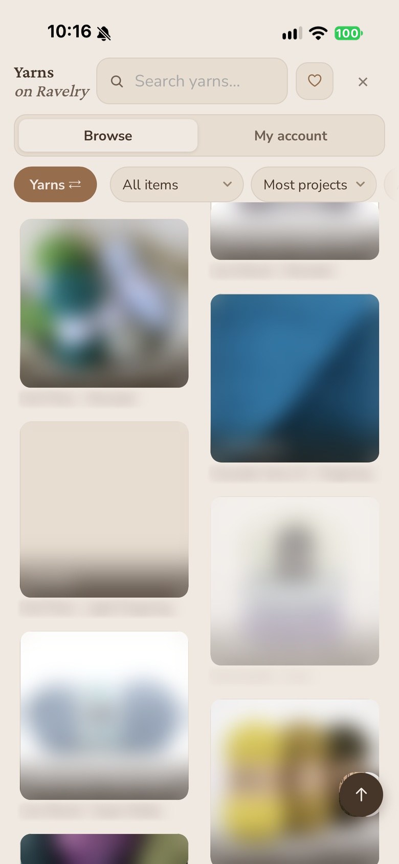 Ravelry's yarn browser inside the app, a grid of yarn photos deliberately blurred, with filters above them.